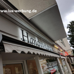 handyladen handyreparatur leuchtreklame berlin agrylbuchstaben auf aluminiumschiene montiert leuchtwerbung ruckleuchtende buchstaben Backlight